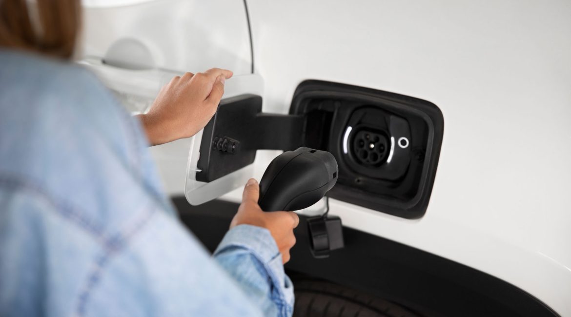 close-up-electric-car-charging-co2-auto