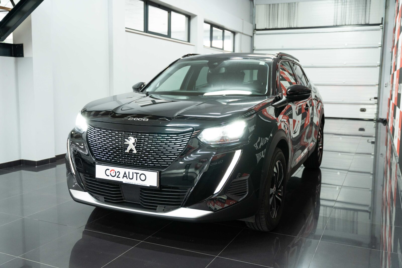 peogeut-2008-preto-carros-co2-pataias-stand-3